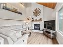 4030 Sunshine Road, Kelowna, BC  - Indoor Photo Showing Living Room With Fireplace 