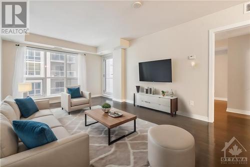 This photo has been virtually staged. - 195 Besserer Street Unit#1806, Ottawa, ON - Indoor Photo Showing Living Room