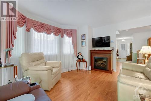 95 Springcreek Crescent, Ottawa, ON - Indoor Photo Showing Living Room With Fireplace