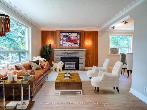 15 Inniswood Dr, Toronto, ON - Indoor Photo Showing Living Room With Fireplace