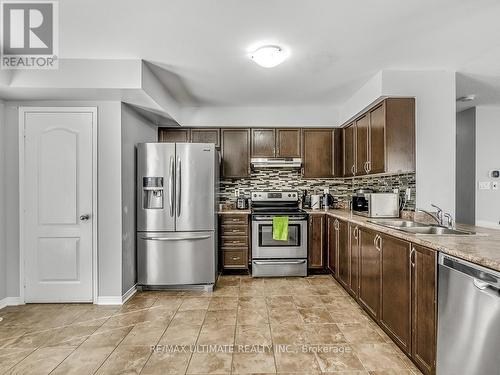 1 - 3088 Thomas Street, Mississauga (Churchill Meadows), ON - Indoor Photo Showing Kitchen With Double Sink