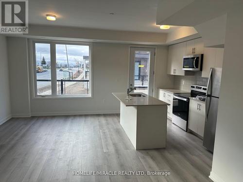 02 - 3415 Ridgeway Drive, Mississauga (Erin Mills), ON - Indoor Photo Showing Kitchen With Stainless Steel Kitchen