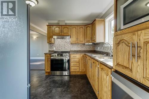 3 Clarkes Place, Upper Island Cove, NL - Indoor Photo Showing Kitchen With Double Sink