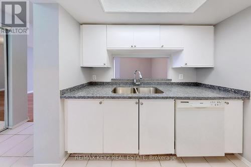 916 - 2550 Lawrence Avenue E, Toronto (Dorset Park), ON - Indoor Photo Showing Kitchen With Double Sink