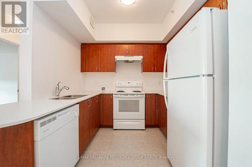 610 - 302 Essa Road, Barrie (Ardagh), ON - Indoor Photo Showing Kitchen With Double Sink