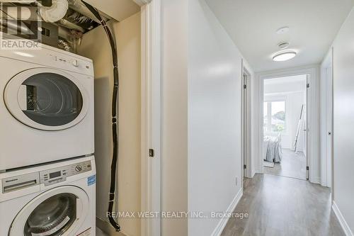 21 - 115 Long Branch Avenue, Toronto, ON - Indoor Photo Showing Laundry Room