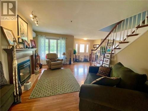 121 Caissie, Shediac, NB - Indoor Photo Showing Living Room With Fireplace