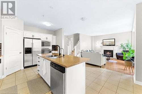 9 Tolton Drive, Guelph, ON - Indoor Photo Showing Kitchen With Fireplace With Double Sink