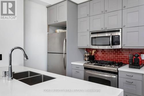 1002 - 127 Queen Street E, Toronto (Church-Yonge Corridor), ON - Indoor Photo Showing Kitchen With Stainless Steel Kitchen With Double Sink