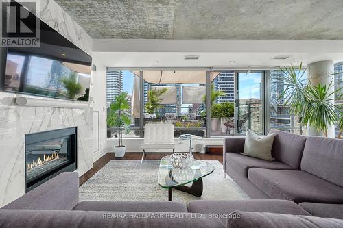 Ph2 - 22 Wellesley Street E, Toronto, ON - Indoor Photo Showing Living Room With Fireplace