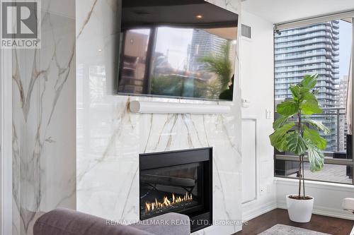 Ph2 - 22 Wellesley Street E, Toronto, ON - Indoor Photo Showing Living Room With Fireplace