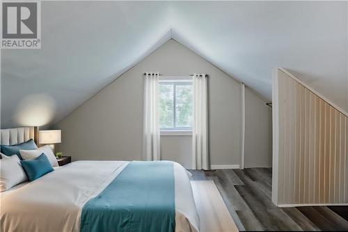 This photo has been virtually staged. - 327 Carleton Street, Cornwall, ON - Indoor Photo Showing Bedroom