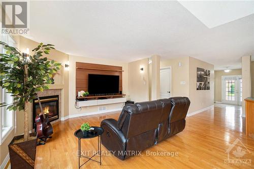 172 Centenaire Street, Russell, ON - Indoor Photo Showing Living Room With Fireplace