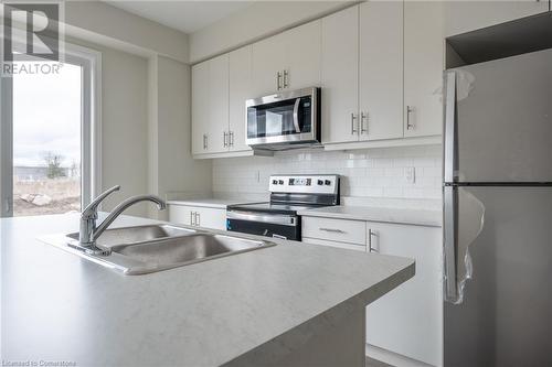 149 Aquasanta Crescent, Hamilton, ON - Indoor Photo Showing Kitchen With Stainless Steel Kitchen With Double Sink With Upgraded Kitchen