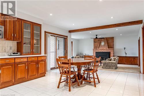 356 Roberts Road, Grimsby, ON - Indoor Photo Showing Dining Room With Fireplace