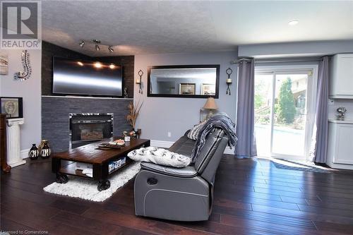 100 Stone Church Road E, Hamilton, ON - Indoor Photo Showing Living Room With Fireplace