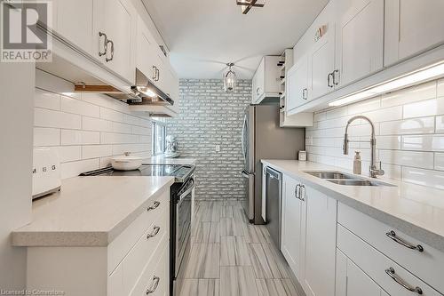 1425 Ghent Avenue Unit# 901, Burlington, ON - Indoor Photo Showing Kitchen With Double Sink