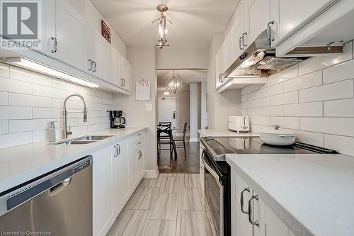 1425 Ghent Avenue Unit# 901, Burlington, ON - Indoor Photo Showing Kitchen With Double Sink