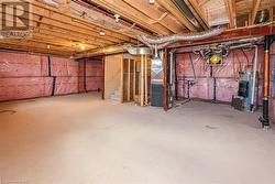 huge unfinished basement with high windows - 