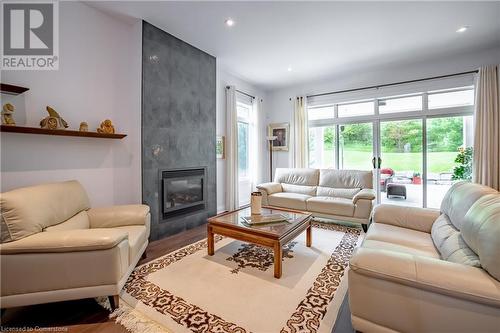 10 David Lowrey Court, Niagara-On-The-Lake, ON - Indoor Photo Showing Living Room With Fireplace