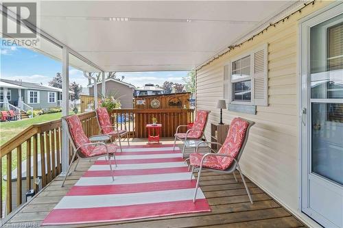 Covered deck at side - 1501 Line 8 Road Unit# 503, Queenston, ON - Outdoor With Deck Patio Veranda With Exterior