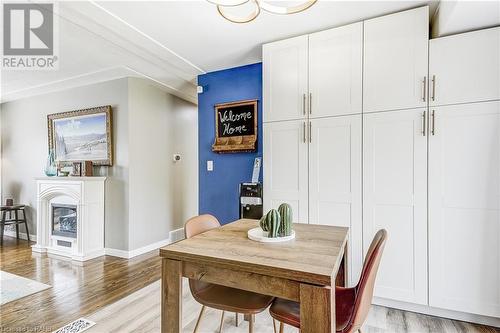 302 Southill Drive, Kitchener, ON - Indoor Photo Showing Dining Room With Fireplace