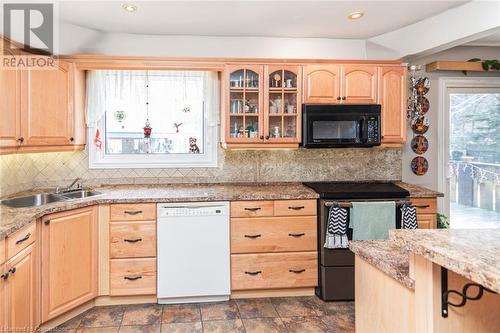 Virtually Staged - 75 Hanover Place, Hamilton, ON - Indoor Photo Showing Kitchen With Double Sink