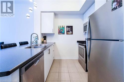 10 Concord Place Unit# 516, Grimsby, ON - Indoor Photo Showing Kitchen With Stainless Steel Kitchen With Double Sink