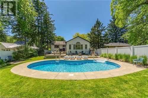 Ingound Pool - 486 Winniett Street, Caledonia, ON - Outdoor With In Ground Pool With Deck Patio Veranda With Backyard