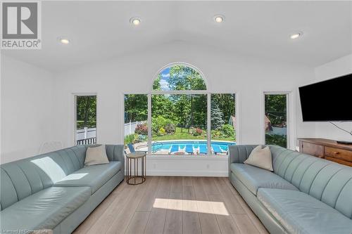 Great Room with view of Inground Pool - 486 Winniett Street, Caledonia, ON - Indoor Photo Showing Living Room