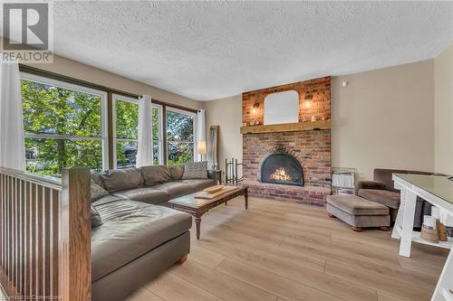 Living Room with Fireplace - 486 Winniett Street, Caledonia, ON - Indoor Photo Showing Living Room With Fireplace