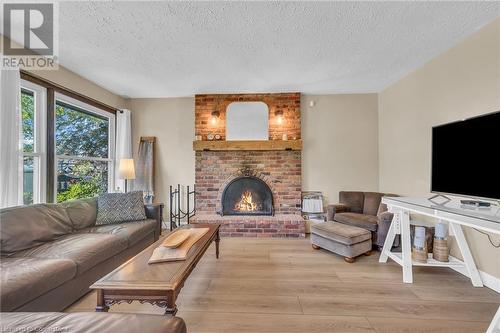 Living Room with Fireplace - 486 Winniett Street, Caledonia, ON - Indoor Photo Showing Living Room With Fireplace