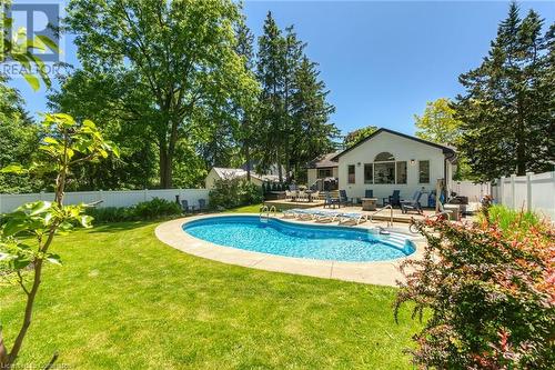 Inground Pool - 486 Winniett Street, Caledonia, ON - Outdoor With In Ground Pool With Deck Patio Veranda With Backyard