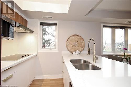 111 Bristol Road E Unit# 110, Mississauga, ON - Indoor Photo Showing Kitchen With Double Sink