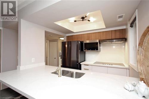 111 Bristol Road E Unit# 110, Mississauga, ON - Indoor Photo Showing Kitchen With Double Sink