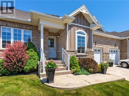 Concrete Drive and Sidewalks - 34 Gamble Lane, Port Dover, ON - Outdoor With Facade