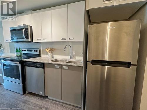 257 Hemlock Street Unit# 420, Waterloo, ON - Indoor Photo Showing Kitchen With Double Sink