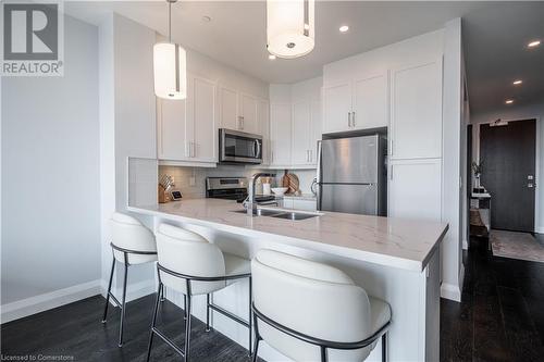 101 Locke Street S Unit# 409, Hamilton, ON - Indoor Photo Showing Kitchen With Double Sink With Upgraded Kitchen