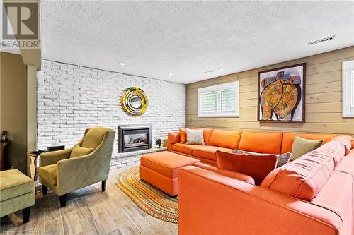 8371 Ares Court, Niagara Falls, ON - Indoor Photo Showing Living Room With Fireplace