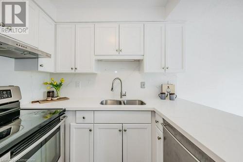 67 Caroline Street S Unit# 302, Hamilton, ON - Indoor Photo Showing Kitchen With Double Sink