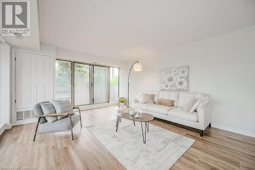 67 Caroline Street S Unit# 302, Hamilton, ON - Indoor Photo Showing Living Room