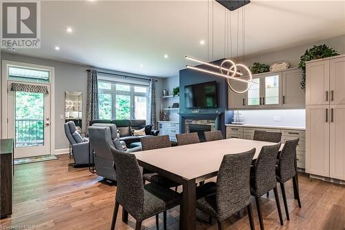 9245 Shoveller Drive Unit# 2, Niagara Falls, ON - Indoor Photo Showing Dining Room With Fireplace