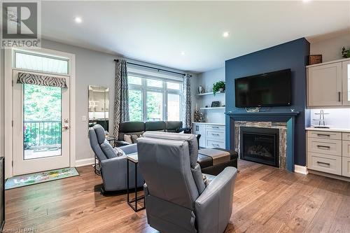 9245 Shoveller Drive Unit# 2, Niagara Falls, ON - Indoor Photo Showing Living Room With Fireplace