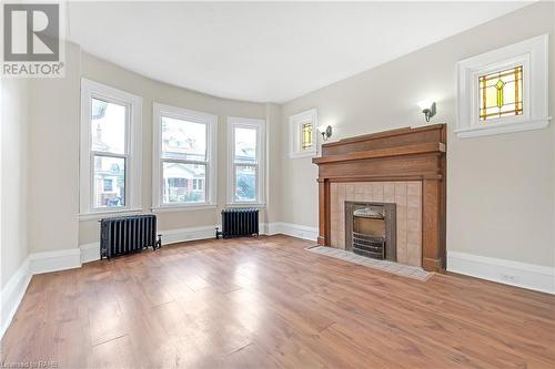 100 Balsam Avenue S, Hamilton, ON - Indoor Photo Showing Living Room With Fireplace