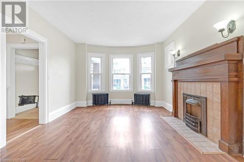 100 Balsam Avenue S, Hamilton, ON - Indoor Photo Showing Living Room With Fireplace