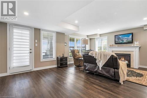 28 Pierre Trudeau Lane, Grimsby, ON - Indoor Photo Showing Living Room With Fireplace