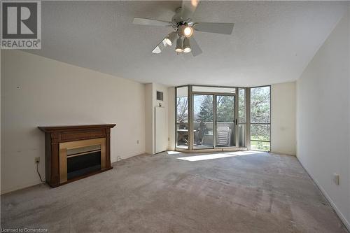 5090 Pinedale Avenue Unit# 203, Burlington, ON - Indoor With Fireplace