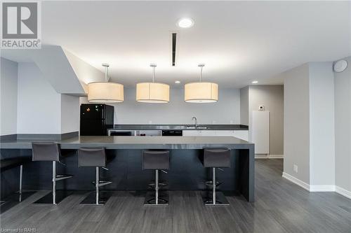 1940 Ironstone Drive Unit# 1104, Burlington, ON - Indoor Photo Showing Kitchen With Upgraded Kitchen