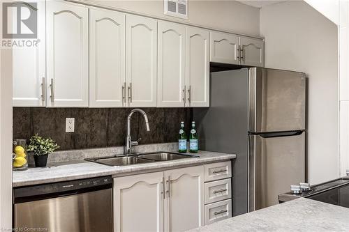 10 John Street Unit# 209, Dundas, ON - Indoor Photo Showing Kitchen With Double Sink