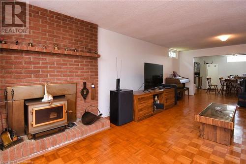 2 Westdale Avenue, Port Dover, ON - Indoor Photo Showing Living Room With Fireplace